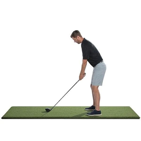 SwingTurf Commercial TeeLine strip with golfer for scale